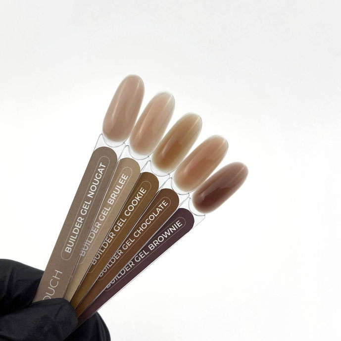 Set of TOUCH Builder Gel applicators with brown shades on a white background - Photo №2