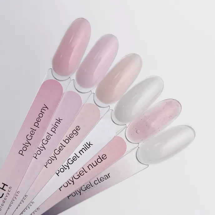 Set of PolyGel nail samples with different colors on a white background