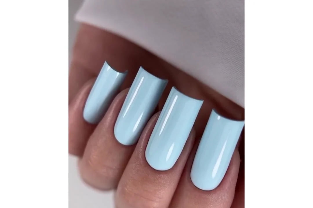 Finished gel polish manicure with HEYLOVE light blue gel polish on square nails