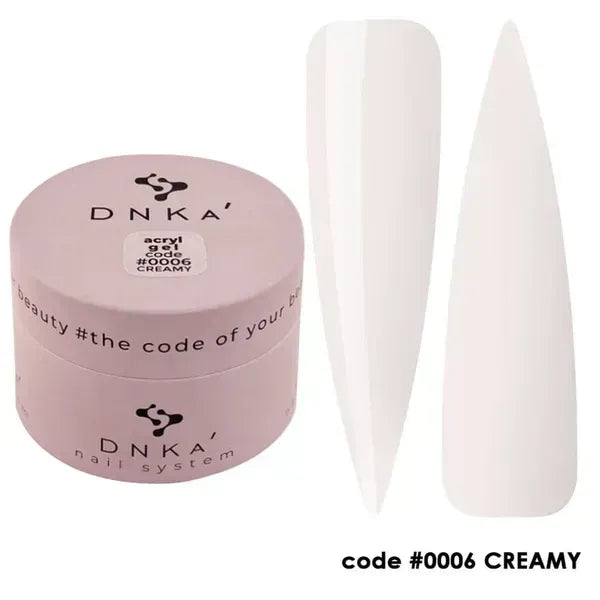 Creamy white acrylic nail powder jar with two long white nail samples, code 0006.