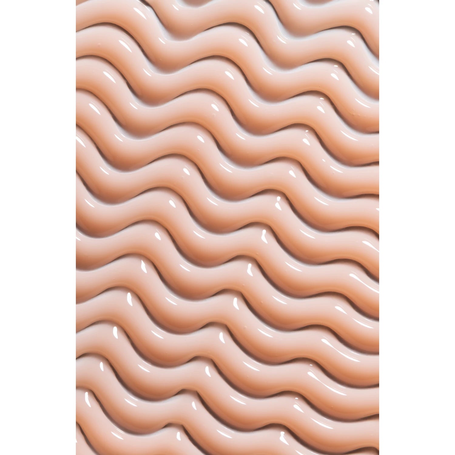 Glossy nude pink UV gel polish with wavy, textured surface for manicure nail art