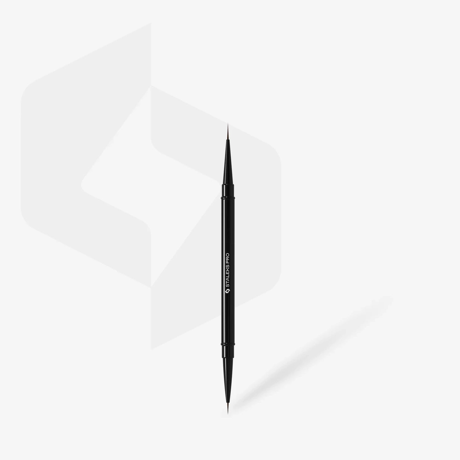 Dual-ended black nail art brush for precise manicure and pedicure designs on white background