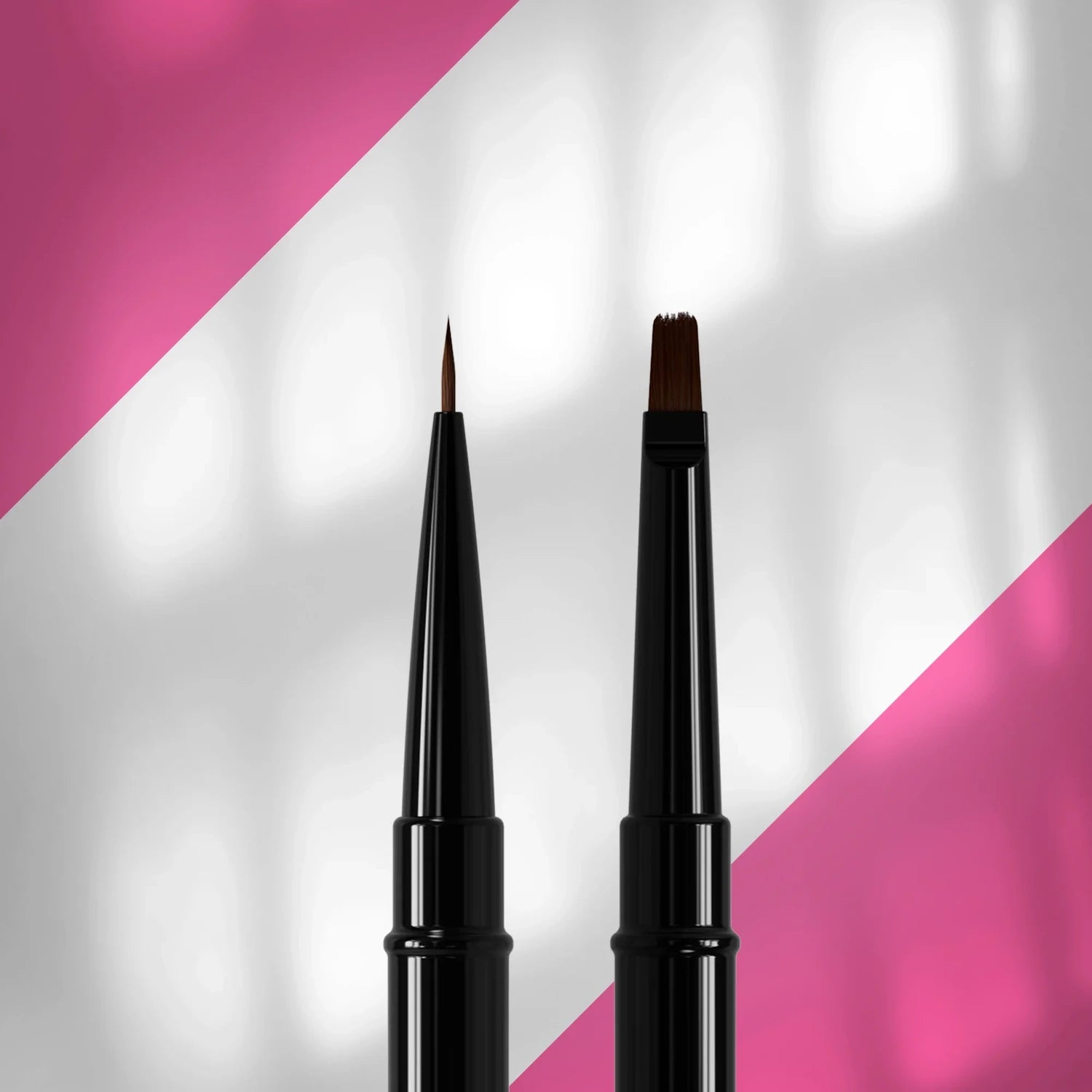 Two black nail art brushes with different tips on a pink and white background, for manicure