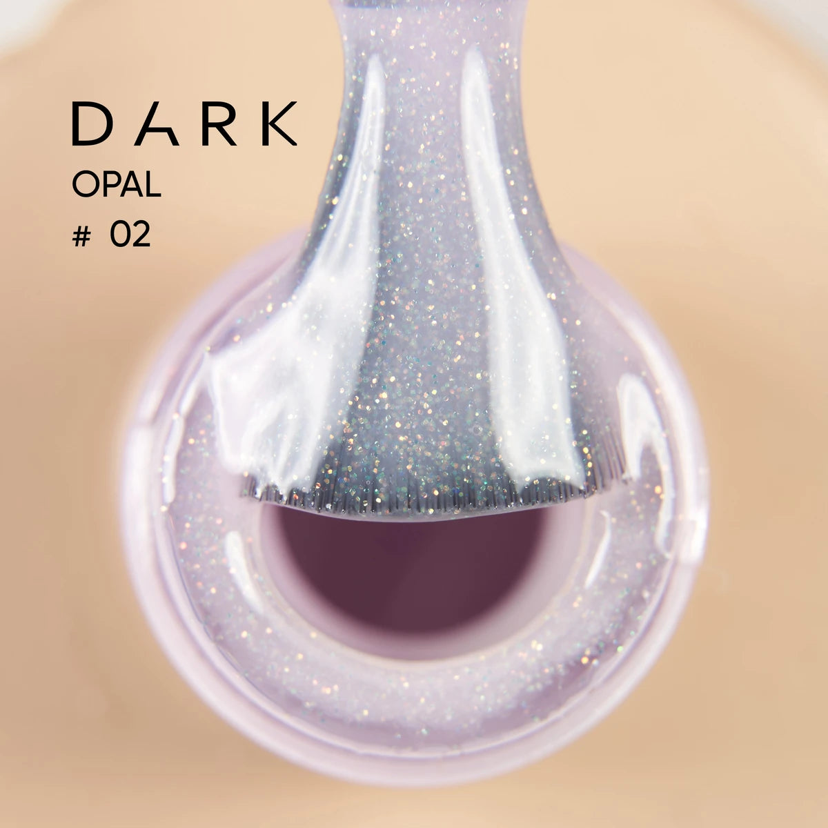 Close-up of glittery purple nail polish brush above open bottle, labeled Dark Opal #02.