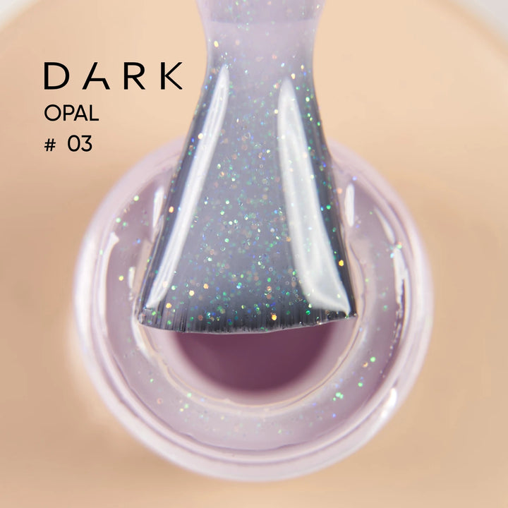 Brush with glittery purple gel polish, labeled Dark Opal 