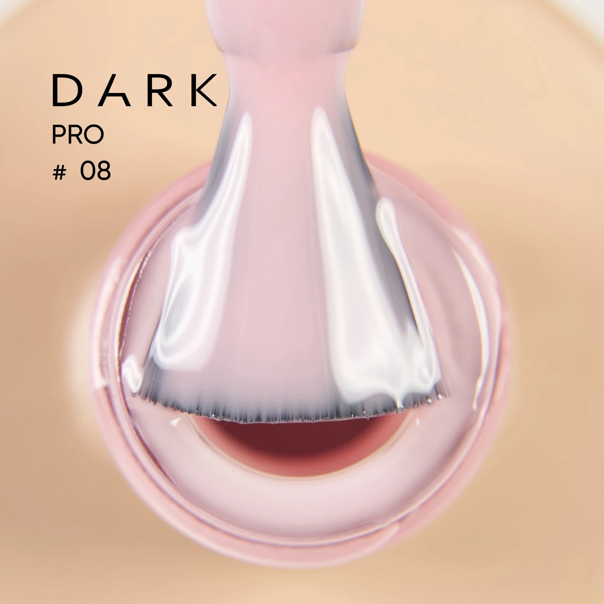Pink UV gel nail polish brush close-up, labeled Dark Pro #08, manicure product