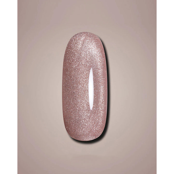 A glossy, glittery nail polish swatch in a dusty rose pink color, displayed on a neutral beige background.