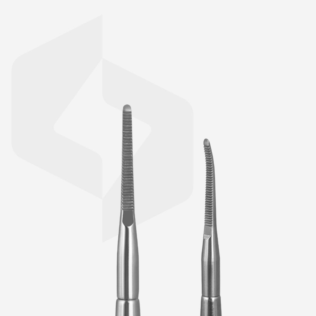 Stainless steel manicure tools for nail care, close-up on two cuticle pushers with textured tips