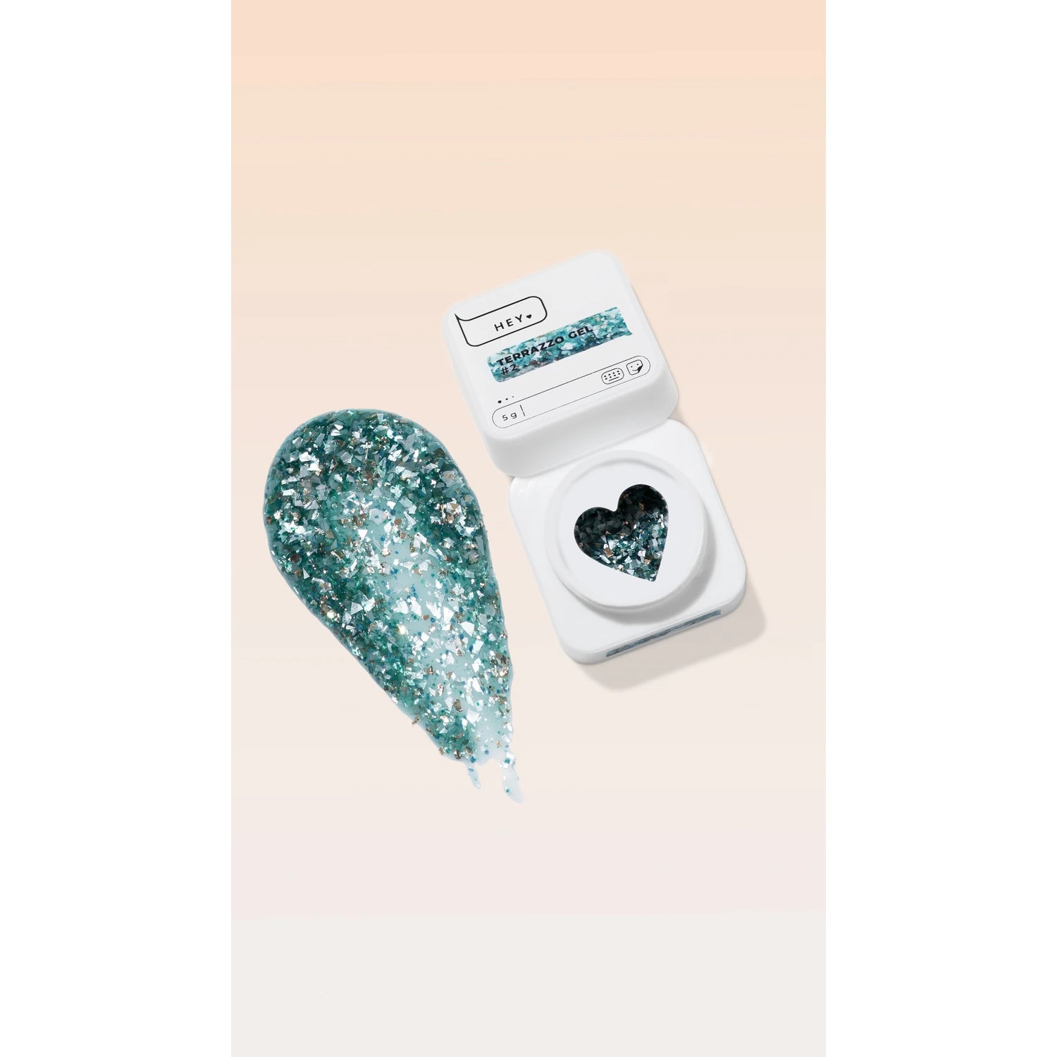 Teal glitter gel nail polish in a white jar with heart-shaped window and matching swatch