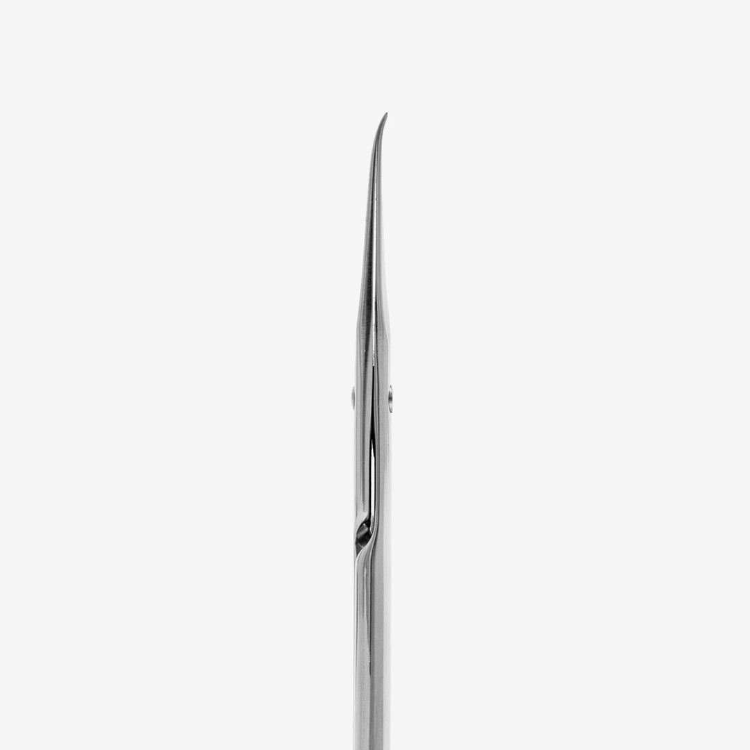 Stainless steel cuticle scissors with a curved tip for manicure and nail care