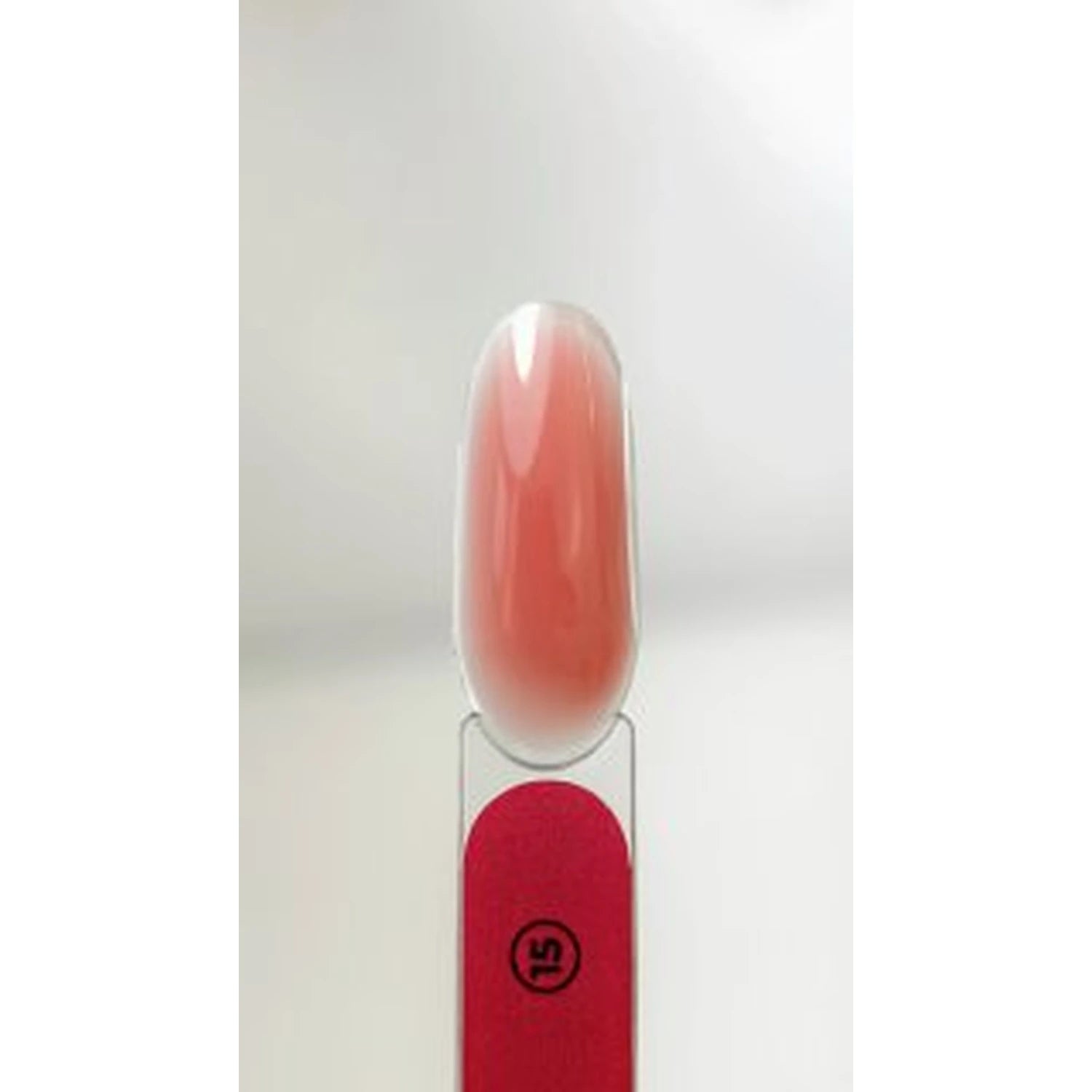 Pink ombre gel nail polish swatch on clear nail display stick