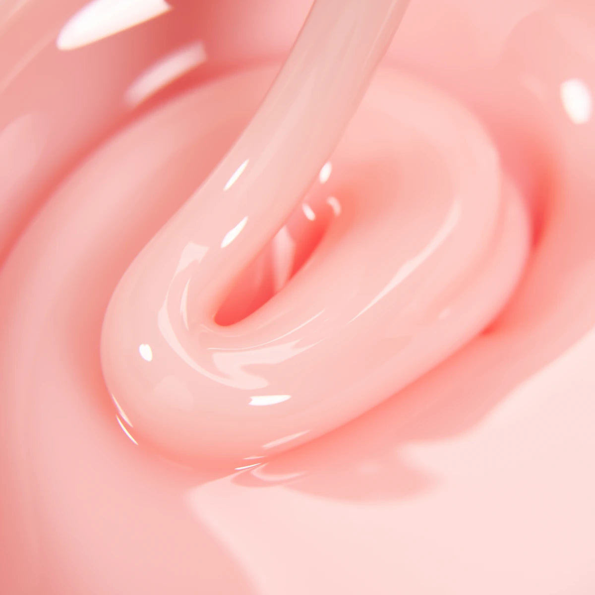 Close-up of glossy pink builder gel, ideal for professional nail extensions and manicures.