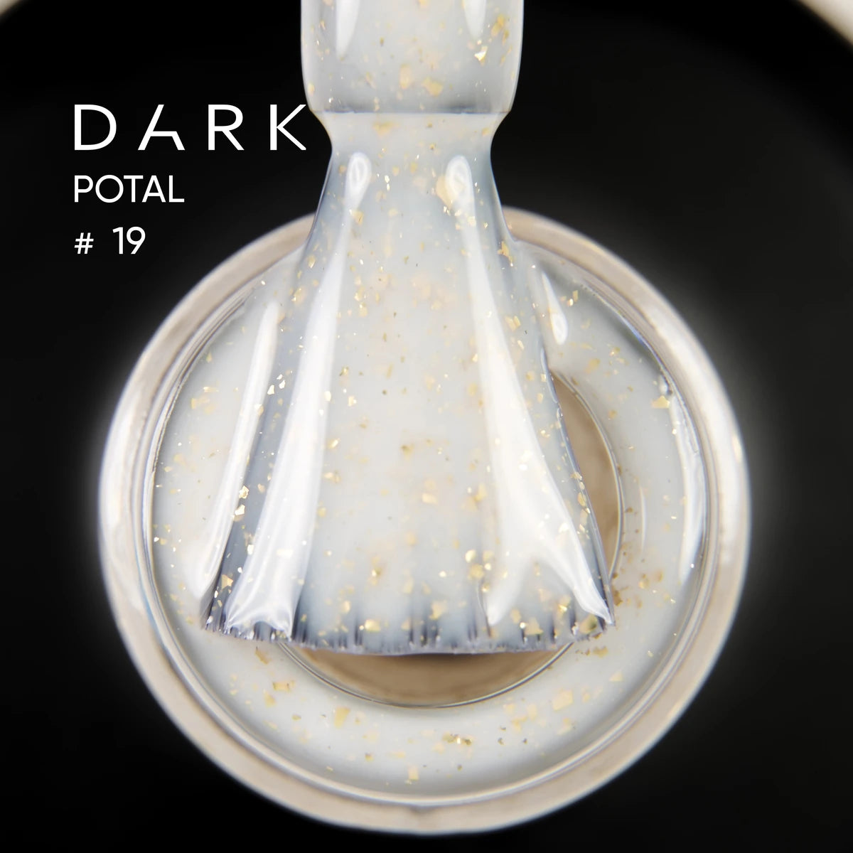 Close-up of a nail polish brush with milky gel and gold glitter flakes, labeled Dark Potal #19.