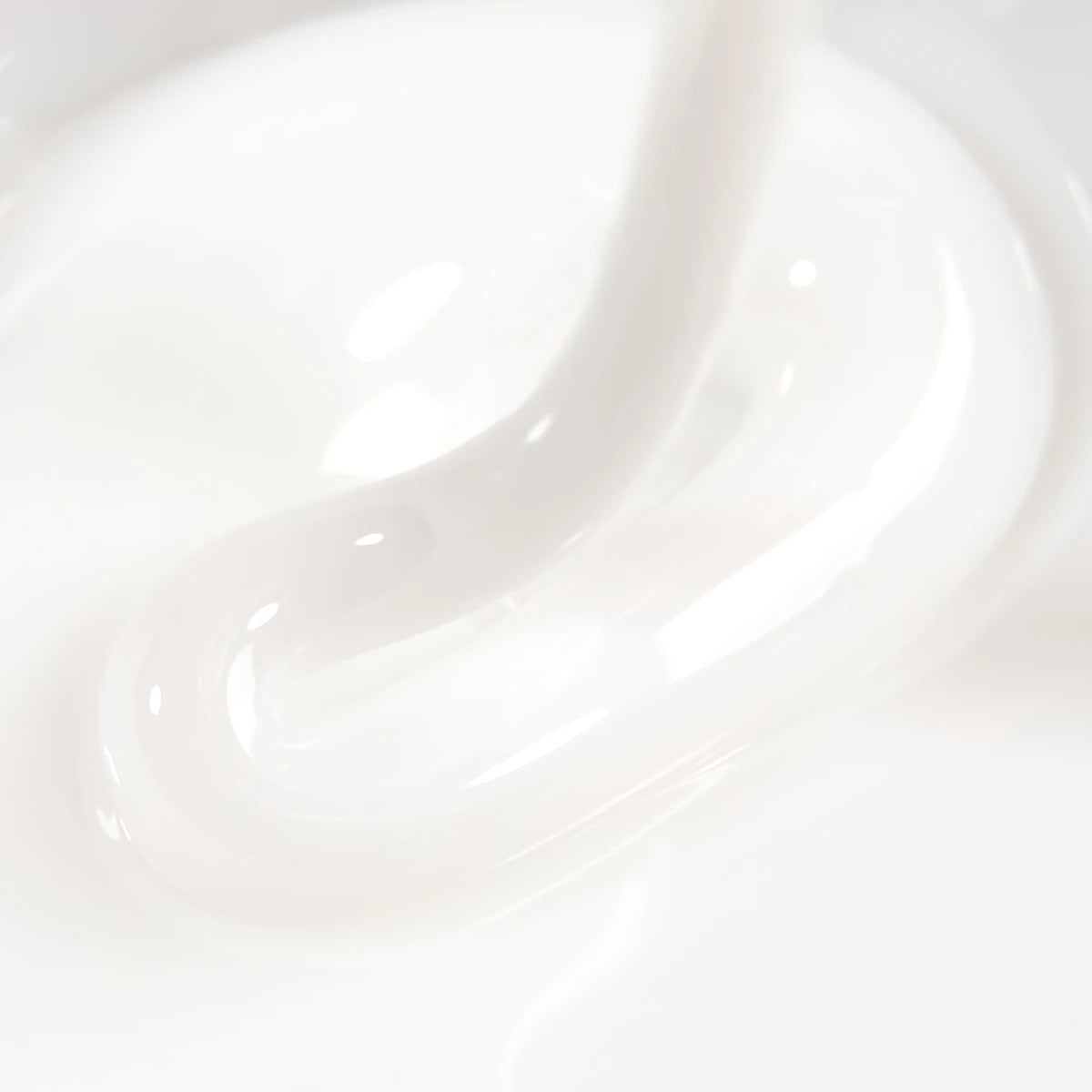Close-up of glossy white builder gel texture for professional nail enhancement