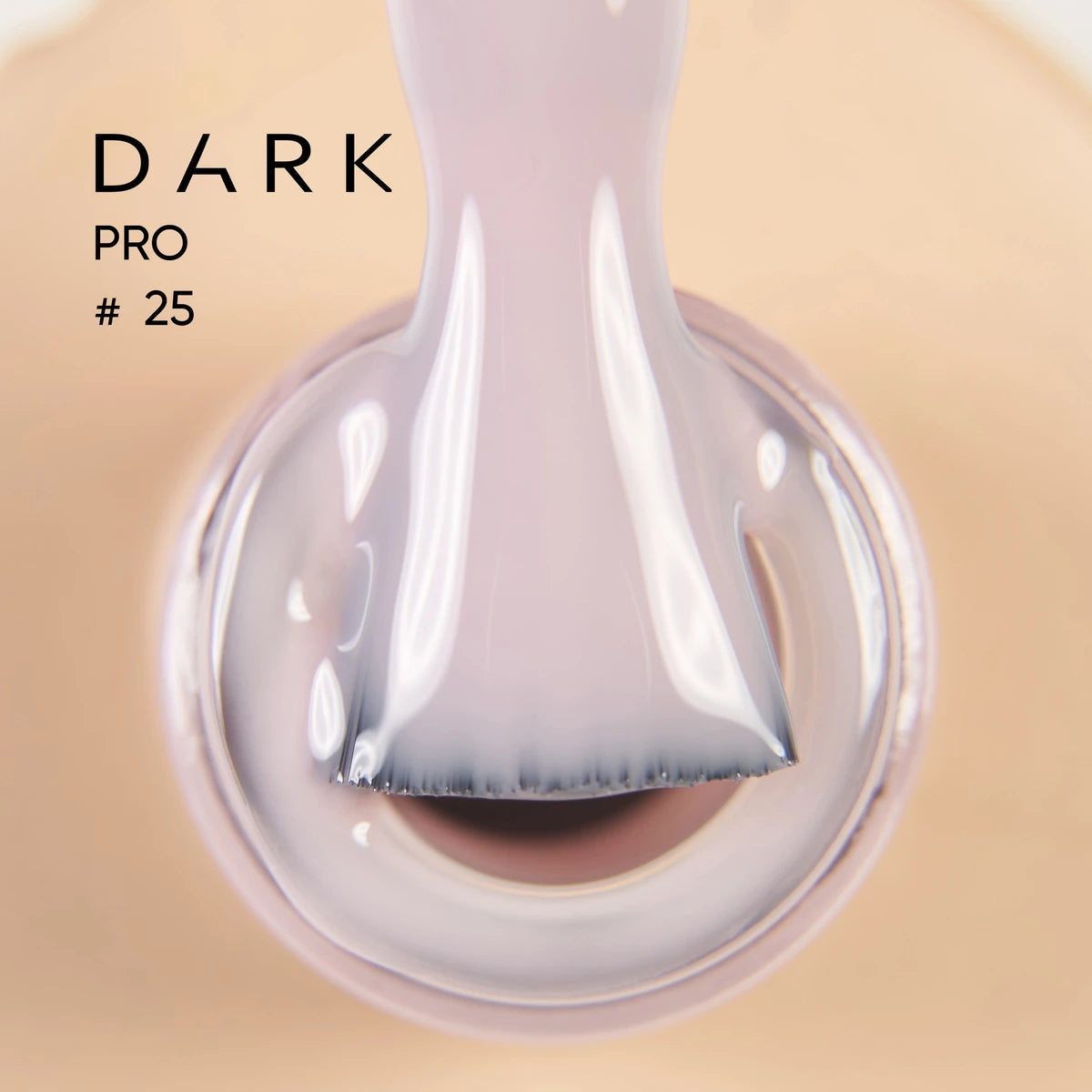Brush applying light beige gel nail polish from bottle, labeled DARK PRO #25.