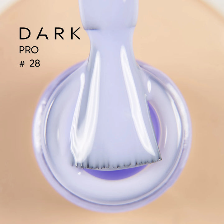 Close-up of brush applying pastel purple gel nail polish from an open bottle, labeled Dark Pro 28.