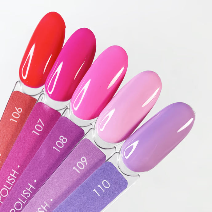 Gel nail polish color samples in gradient shades of red, pink, and purple on swatch sticks