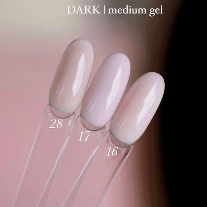 Three medium gel nail polish swatches in nude shades, labeled 28, 17, and 16.