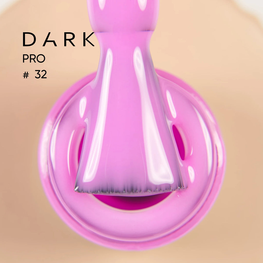 Pink gel nail polish bottle open with brush, shade labeled Dark Pro 
