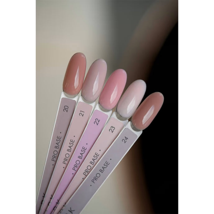 Five nail color swatches in nude and pink UV gel shades, labeled 20 to 24, manicure sample