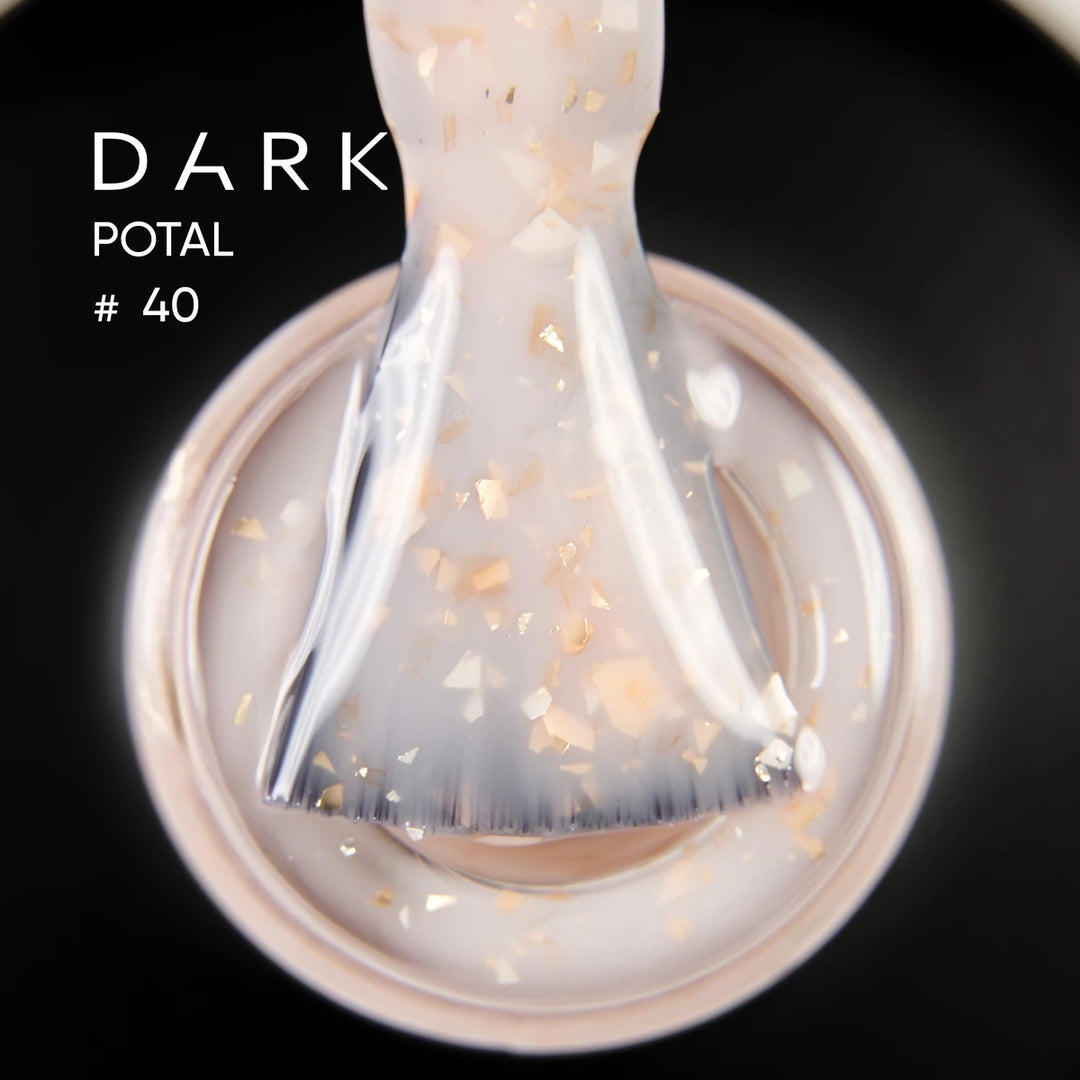Brush dipped in milky nail gel with gold flakes, labeled Dark Potal 