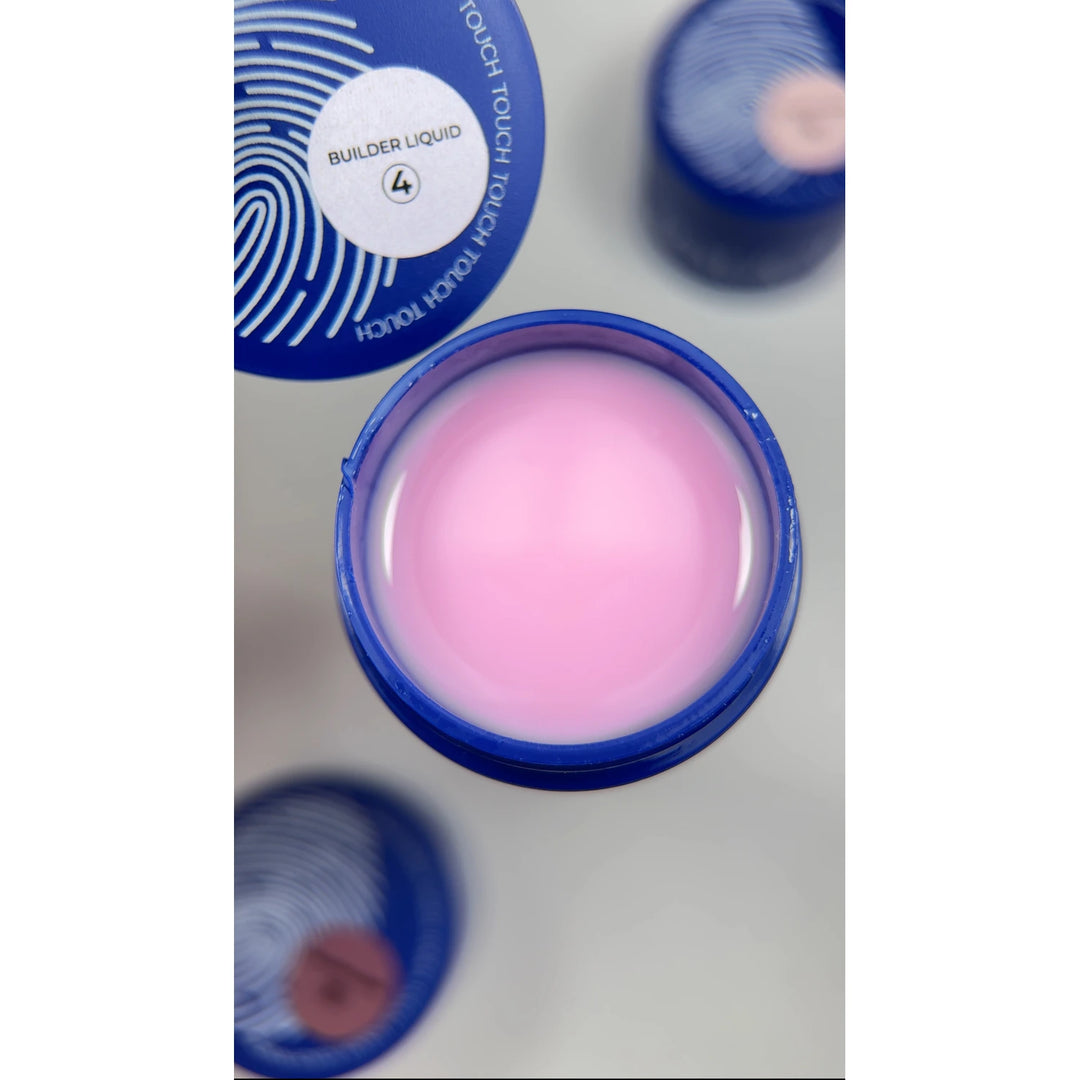 Open jar of pink builder gel for nails in a blue container, overhead view