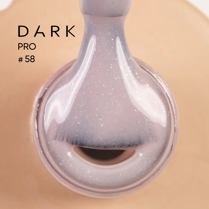 Iridescent glitter nail gel polish on brush above open bottle, labeled Dark Pro 