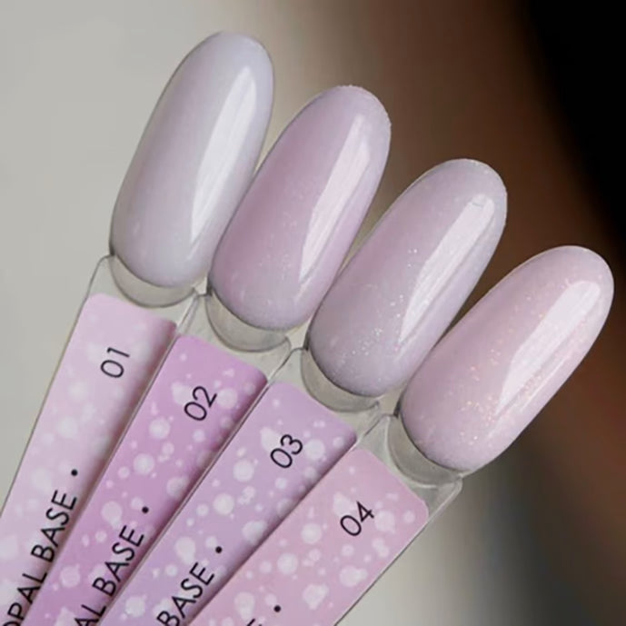 Set of four pastel purple UV gel nail polish swatches with subtle shimmer, labeled 01 to 04
