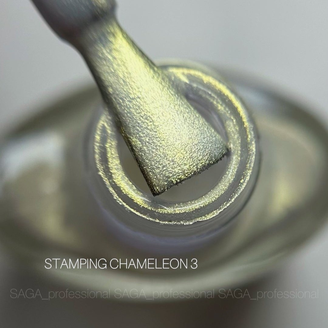 Close-up of metallic chameleon nail polish brush with gold shimmer, stamping polish.