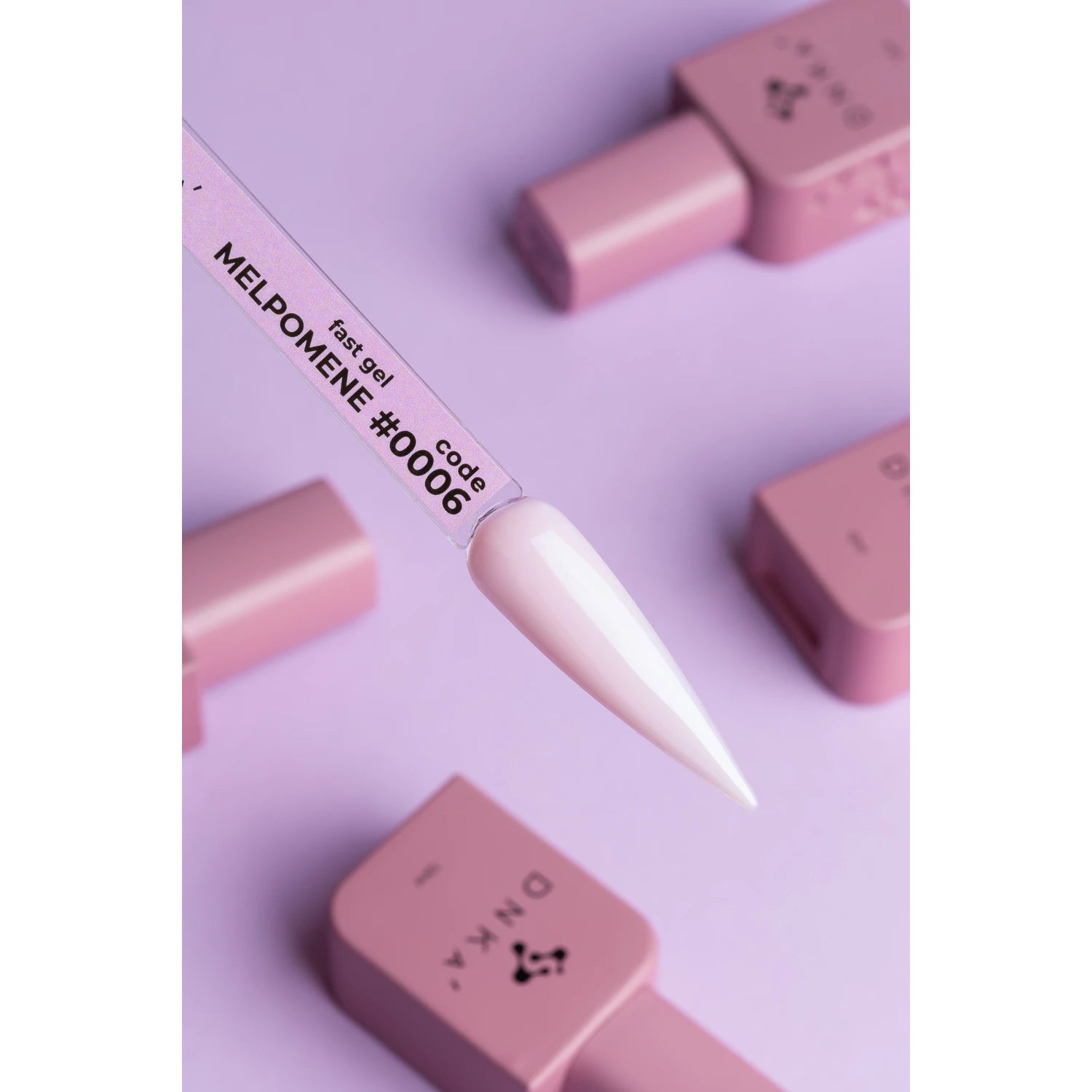 Light pink fast gel nail polish swatch labeled MELPOMENE #0006 with matching bottles