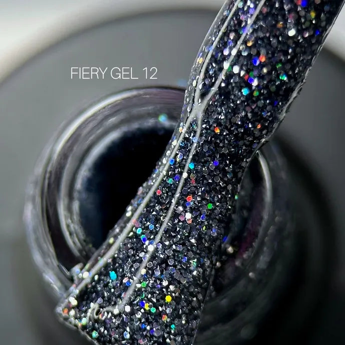 Close-up of Fiery Gel 12 black glitter UV gel nail polish with colorful sparkle texture