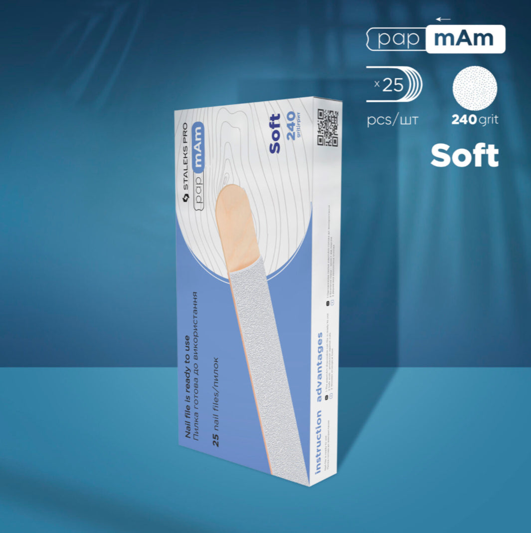 Box of 25 Staleks Pro nail files 240 grit soft for manicure and pedicure on blue background