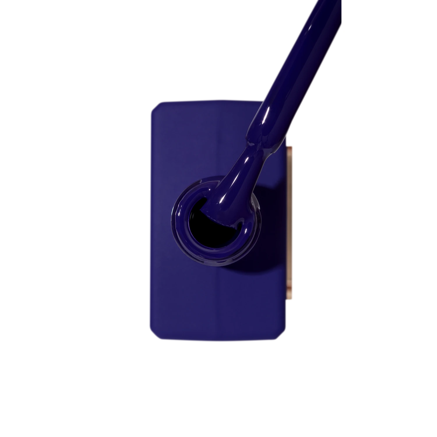 Open bottle of deep purple nail polish with applicator brush above