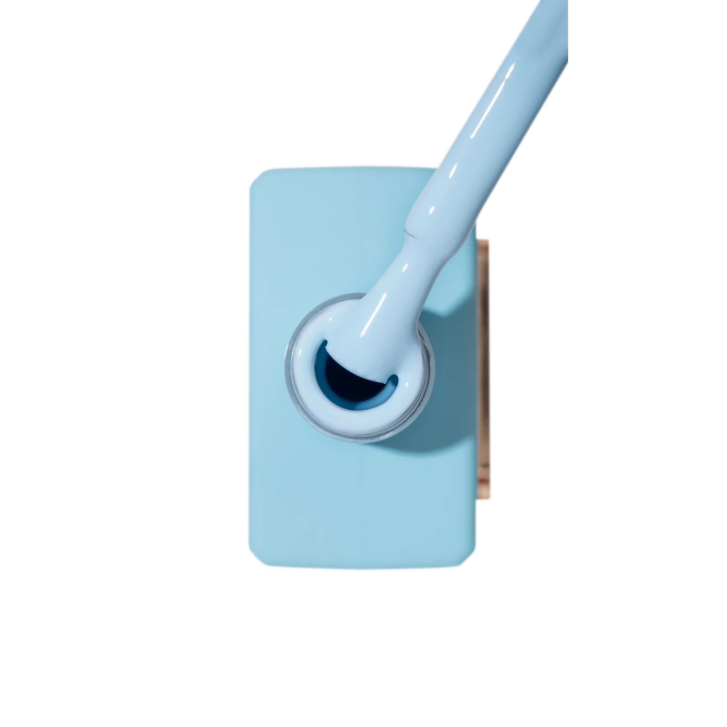 Light blue gel nail polish bottle with brush, professional manicure product