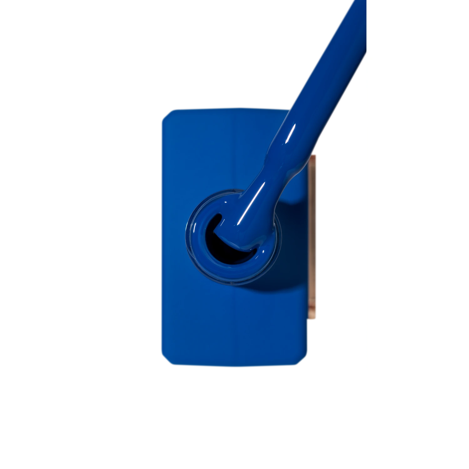 Vibrant blue gel nail polish with brush, professional manicure product