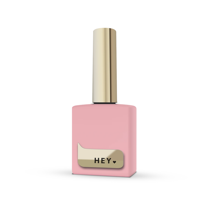 Pink gel nail polish bottle with gold cap and HEY label, manicure accessory