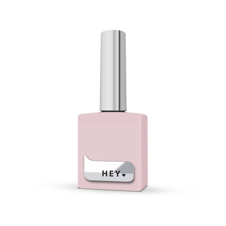 Pink nail polish bottle with silver cap and label, professional manicure accessory