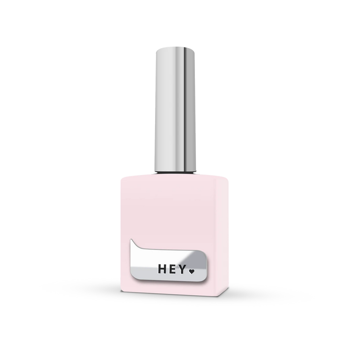 Light pink gel nail polish bottle with metallic cap and HEY label for manicure