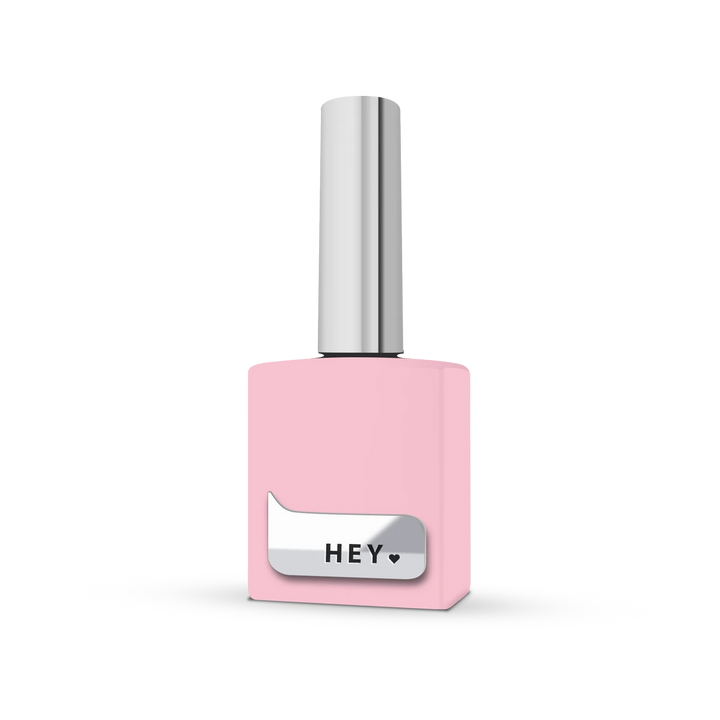 Pink nail polish bottle with silver cap and HEY label for manicure and pedicure