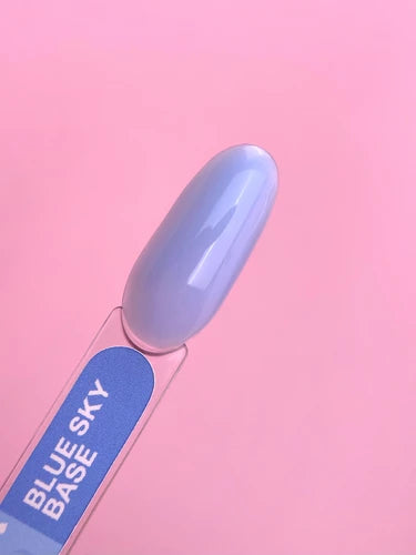 Blue Sky Base gel nail polish swatch on display stick against pink background