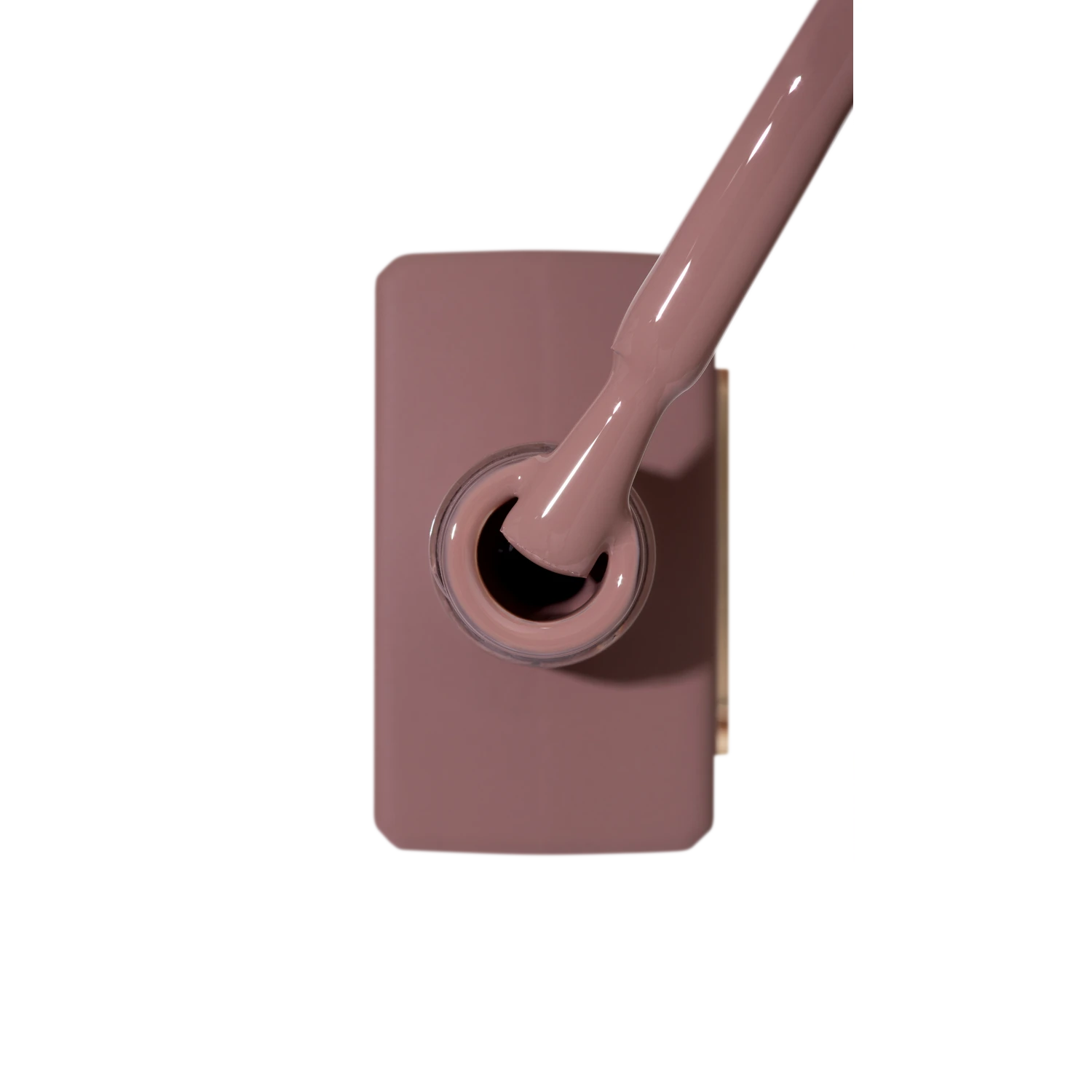 Brown rose gel nail polish bottle with applicator brush, perfect for manicures