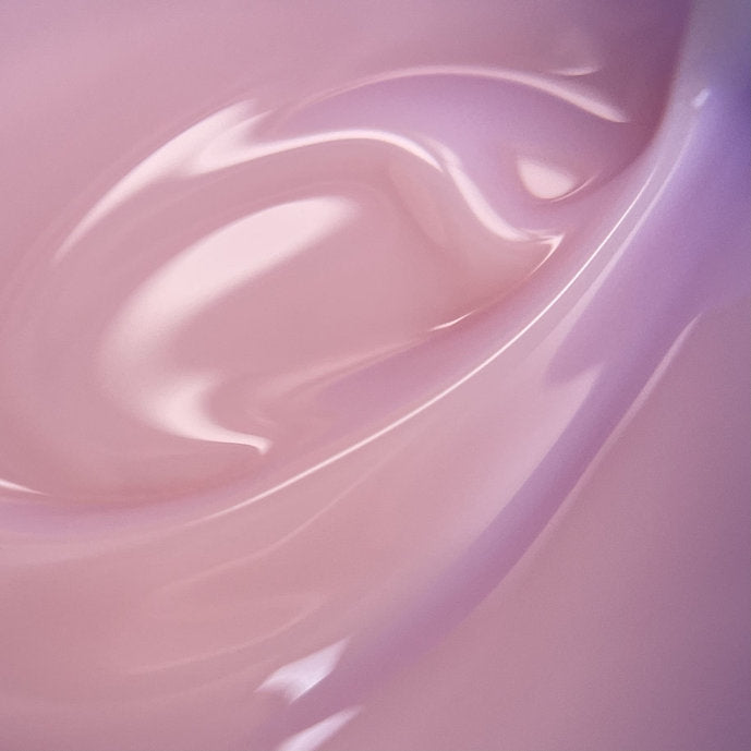 Pink builder gel liquid texture for nail extensions and manicures, glossy and smooth surface
