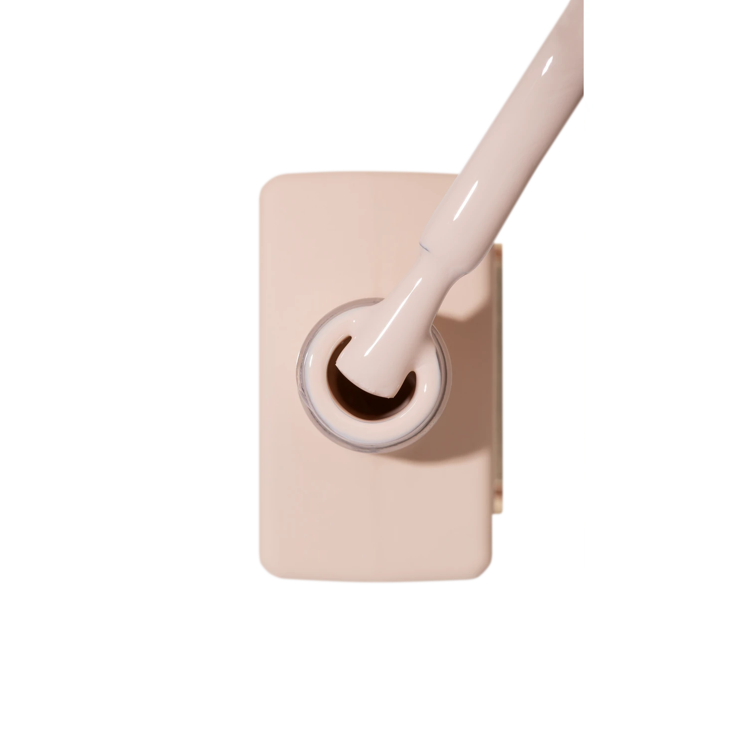 Beige nude nail polish bottle with brush, ideal for manicure and pedicure