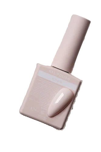 Pink nail polish with matching brush on a white background