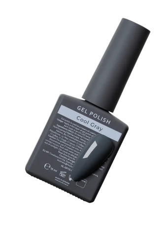 Cool gray gel nail polish bottle with attached swatch for manicure
