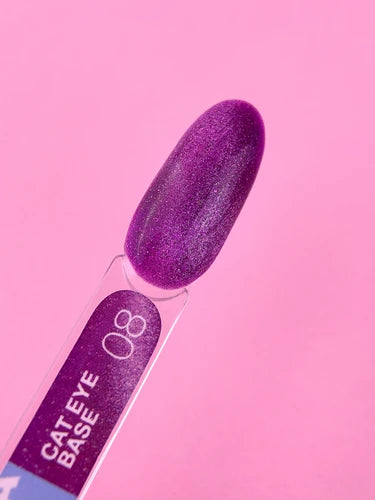 Purple cat eye gel polish swatch on clear nail tip, labeled base 08, pink background