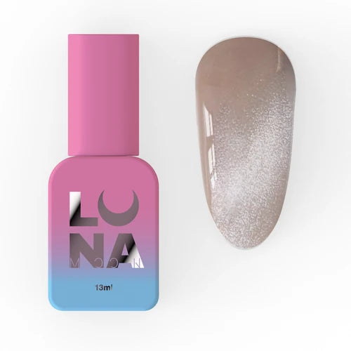 Pink and blue bottle of cat eye gel polish next to a shimmering beige nail sample