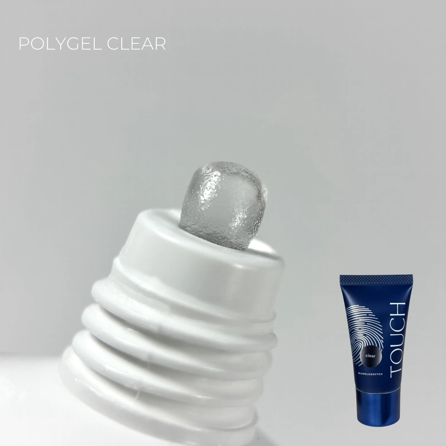 Clear polygel for nails shown on tube tip with product packaging, manicure supplies