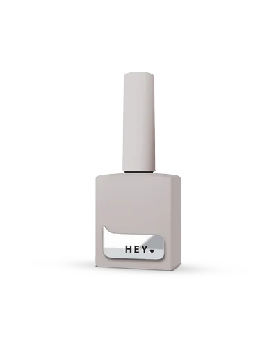 Neutral beige nail polish bottle with minimalist label and white cap for manicure