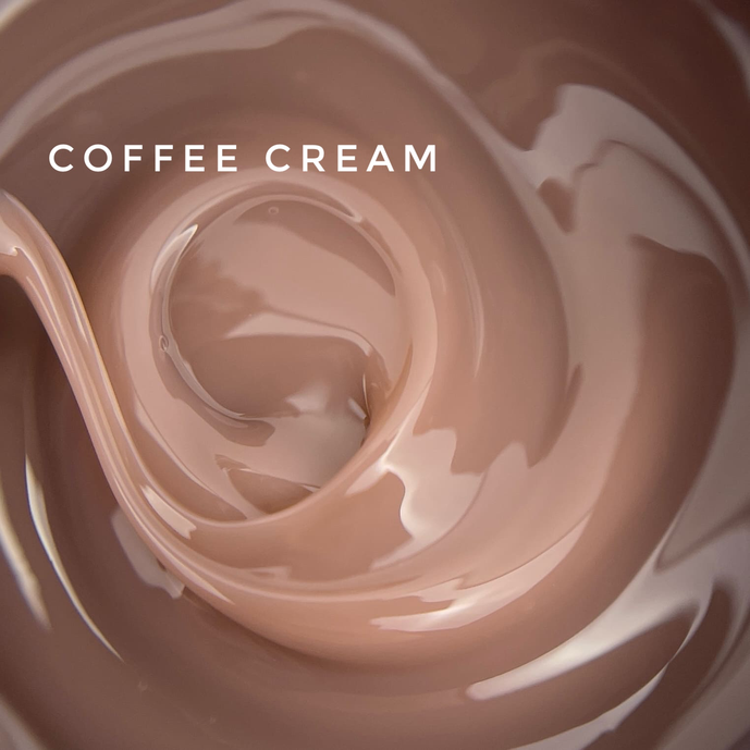 Swirl of glossy coffee cream brown gel, nail polish texture with smooth finish